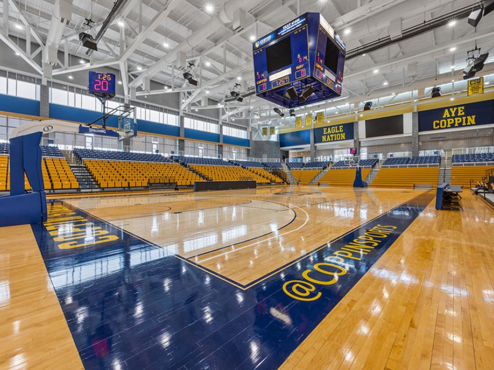 The Arena with view of stadium seating and the jumbotron in the center of the court