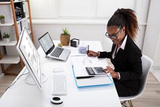 An Accounting professional working at their desk