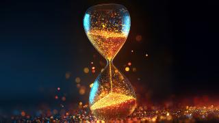 Hourglass with gold metallic sand