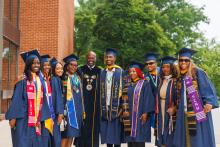 Graduates with President Jenkins at 2024 Commencement 